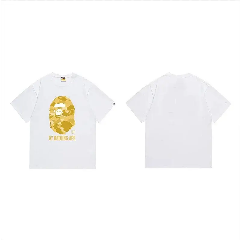 BAPE White T - Shirt with Yellow Camouflage Ape Head Logo and "BY BATHING APE" Text