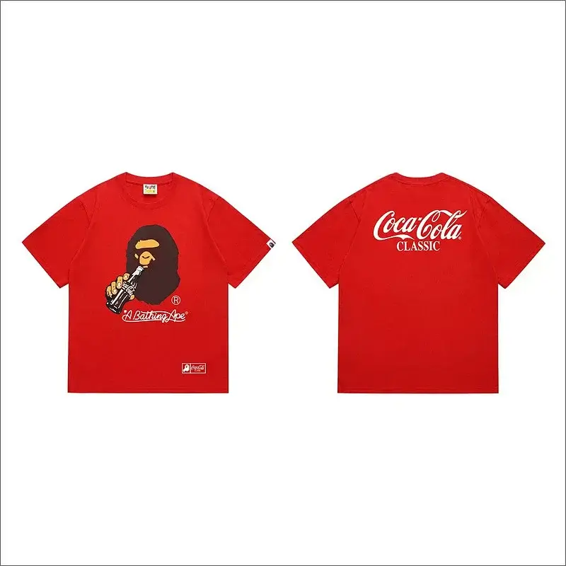A Bathing Ape x Coca - Cola Red Short Sleeve T - Shirt with Ape Head & Classic Logo