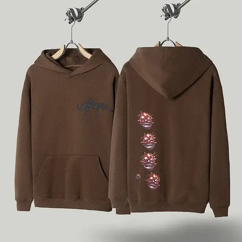 Travis Scott Brown Hoodie with Graffiti & Spiked Skulls