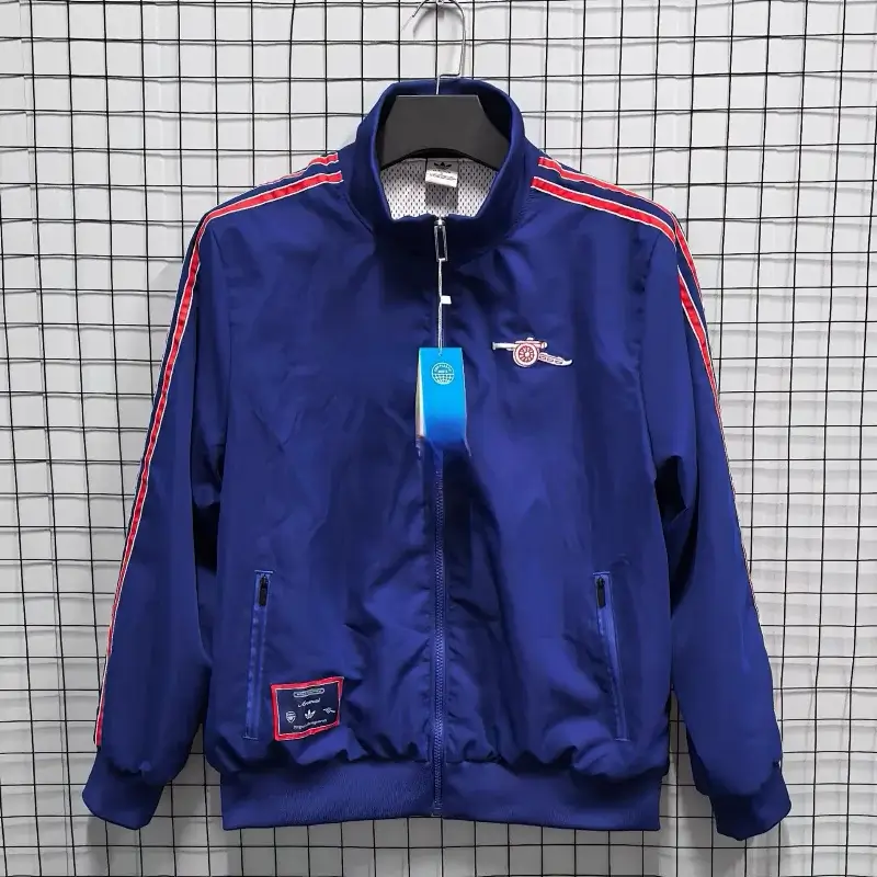 Corteiz Blue Track Jacket with Red Stripes, Zipper, Pockets & Arsenal Logo