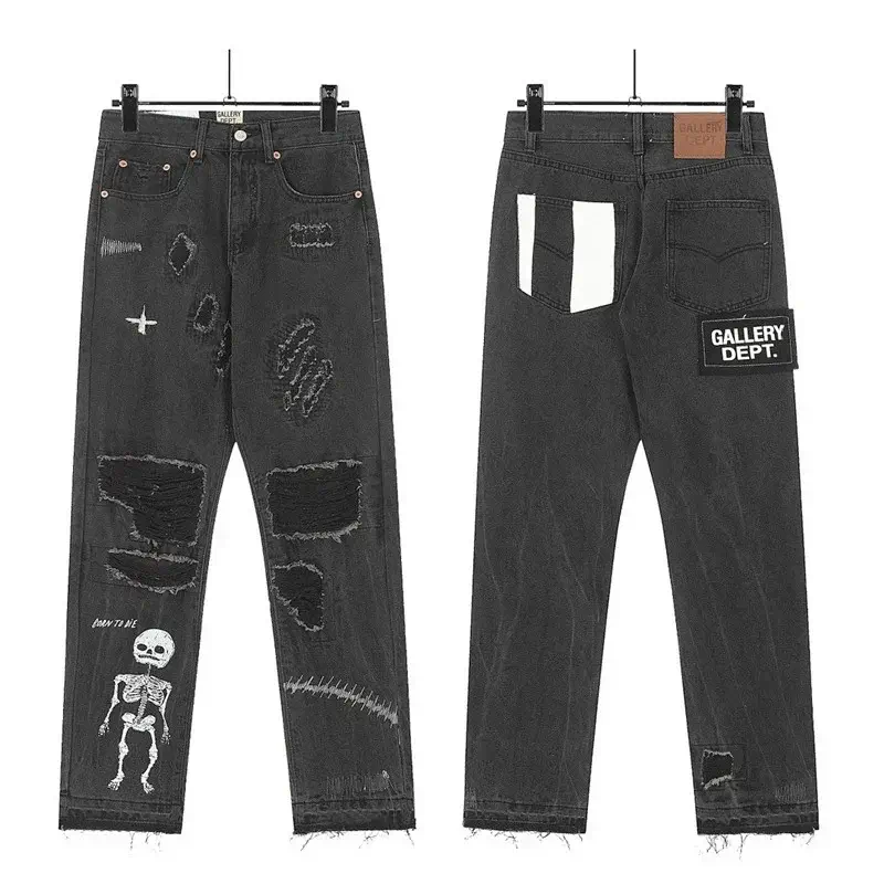 GALLERY DEPT. Black Distressed Jeans with Skeleton Print, Patches & Raw Hem