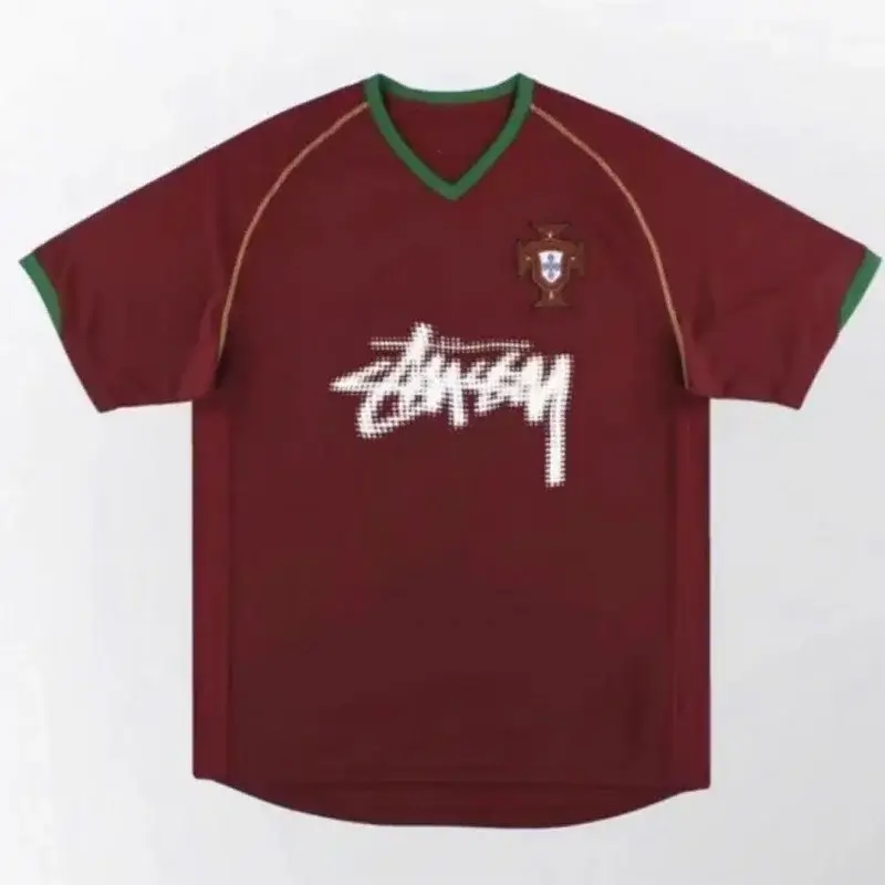 Stussy Burgundy T-Shirt with Green Trim & Portugal Badge